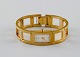 Klassisk Calvin Klein Lady bøjle armbåndsur. Sent 1900-tallet.  Urkassen måler: 28 x 16 mm.I ...