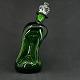 Højde 26 cm.Klukflaske med kroneprop fra Holmegaard.Klukflasken er et af Holmegaards ...