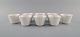 Wilhelm Kåge 
for 
Gustavsberg. 
Eight cups in 
white glazed 
porcelain. 
Swedish design, 
...