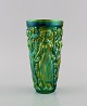 Zsolnay vase in 
glazed ceramics 
modeled with 
women picking 
grapes. 
Beautiful 
metallic luster 
...