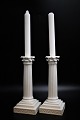 A pair of rare old Royal Copenhagen column candlesticks in white porcelain with 
Juliane Marie brand. H:22cm.