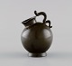 Just Andersen (1884-1943), Danmark. Tidlig miniature vase i diskometal. Hank formet som slange. ...