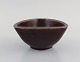 Jais Nielsen for Royal Copenhagen. Bowl in glazed ceramics. Beautiful ox blood 
glaze. 1930s.
