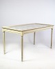White painted 
tile table from 
around the year 
1940s. Stands 
with fine paint 
in good ...