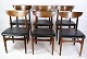 A set of six 
dining table 
chairs of 
Danish design 
in rosewood 
with black 
leather from 
around the ...