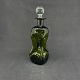 Højde 22 cm.Klukflaske i olivengrønt glas med kuglerund prop fra Holmegaard.Klukflasken ...
