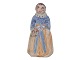 Hjorth keramik miniature figur, dame i egnsdragt.Højde 7,5 cm.Perfekt stand uden fejl.