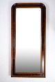 Spejl af hånd poleret mahogni, lavet i Danmark fra omkring 1890'erne.Mål i cm: H:117 B:54