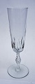 Champagnefløjte med olivslibninger på kummen a la Derby glasset fra Holmegaard Glasværk. Stilken ...