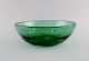 Scandinavian glass artist. Unique bowl in green mouth-blown art glass. Mid-20th 
century.
