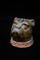 Gammel keramik sparrebøsse i form af hunde hovedmed gammel bemaling og fin patina. H:8,5cm. ...