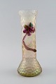 Lötz art nouveau vase in frosted mouth-blown art glass with purple flowers in 
relief. Approx. 1900.
