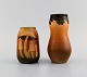 Ipsens enke, 
Danmark. To 
vaser i 
håndmalet og 
glaseret 
keramik. Svampe 
og bladværk. 
...