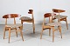 Hans J. Wegner 
(1914-2007)
Sæt på 4 stole 
model CH 33 
fremstillet af 
eg 
og teaktræ - 
sæder ...