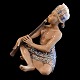 Dahl Jensen; Porcelænsfigur "Orientalsk fløjtespiller".Model #1153. H. 21,5 cm B. 21 cm. ...