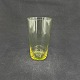 Højde 10 cm.
Cylinderformet 
sodavandsglas 
fra 1930'erne.
Farven er 
grønlig citrin 
men under ...