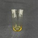 Højde 10 cm.
Cylinderformet 
sodavandsglas 
fra 1930'erne.
Farven er lyst 
honningfarvet.
De ...