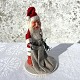 Julemand med 
gummihoved og 
gavesæk, 16cm 
høj, 9cm i 
diameter *Pæn 
patineret 
stand*