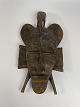 Dekorativ 
Kpelie maske 
med fugl på 
toppen, 
Senufo-stammen, 
Elfenbenskysten 
i Afrika. 20. 
...