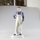 Figur i 
porcelæn nr. 
2431 med motiv 
af maleren. 
Hvide bukser og 
blå skjorte. 
Producent Bing 
...