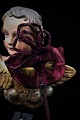 Dekorativ Christian Dior maske til maskeradebal i mørk vinrød velour med fin patina fra omkring ...