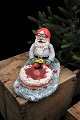 Santa Claus with a layer cake in painted plaster with a fine old patina...