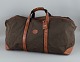Longchamp, stor rejsetaske i canvas og kernelæder.Sent 1900-tallet.I flot stand.Mål: L 75 ...