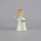 Miniature 
englefigur i 
porcelæn år 
2004 af dreng 
med salmebog 
nr. 131
Producent Bing 
& ...