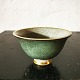 Grøn krakeleret 
skål i porcelæn 
fra Royal 
Copenhagen. I 
god stand. 
Ingen skader 
eller ...