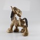 Figur i keramik 
med motiv af 
hest som kigger 
bagud
Design Thomas 
Dam
Mærket DAM
Højde ...