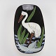 Glaseret platte i keramik med motiv af stork Producent Arnold Wiigs fabrikker, Halden, ...