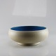 Skål i mat 
råhvid keramik 
med blå glasur
Producent 
Kähler
Højde 8 cm
Diameter 18 
...