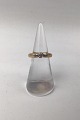 Georg Jensen 
18K Gold Ring 
with Diamond 
Ring Size 47 
(US 4) Weight 
6.5 gr (0.23 
oz)