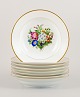 Bing & 
Grøndahl, otte 
dybe tallerkner 
i porcelæn 
håndmalet med 
polykrome 
blomster og ...