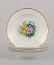 Bing & 
Grøndahl, fire 
dybe tallerkner 
i porcelæn 
håndmalet med 
polykrome 
blomster og ...