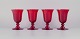 Et sæt på fire 
store vinglas i 
rødt glas.
Sverige.
Sent 
1900-tallet.
Perfekt stand.
Mål: H ...