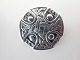 Skotsk broche i sølv med keltisk motiv.