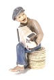 Dahl Jensen. Harmonika spillende dreng. Model # 1154. Højde 22 cm. ( 1 sortering )