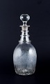 Old Danish wine carafe in mouth-blown glass engraved with grape clusters.