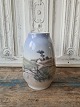 Royal 
Copenhagen vase 
decorated with 
landscape motif 

No. 2776/1224, 
Factory first
Height 19,5 
cm.