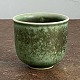 Solgt.
Lille Saxbo 
vase med grøn 
og koksgrå 
glasur. 
Stemplet SAXBO 
DENMARK 5 samt 
monogram. ...