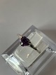 Silver ladies' 
ring with 
swarovski 
amethyst
stamped 925S
Size 57
Nice and well 
maintained ...
