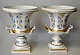 Et par tyske 
porcelæns pryd 
vaser, 19. årh. 
Håndmalet med 
strøblomster og 
forgyldninger. 
Med to ...