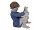 Sjælden Royal 
Copenhagen 
Figur, pige 
børster hvid 
kat.
Af 
fabriksmærket 
ses det, at 
denne er ...
