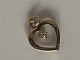 Heart with 
Zircon Pendant 
#14 carat Gold
Stamped 585
Height 14.50 
mm
Width 11.66 mm
Nice and ...