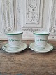 Par franske 
café brûlot 
kopper i 
kraftigt jern 
porcelæn 
dekoreret med 
grønne striber 
samt ...