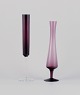 Svensk 
designer, to 
vaser i 
kunstglas 
udført i slankt 
design.
Violet og 
klart mundblæst 
...