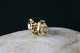 Earrings shaped like a dolphin, in 14 carat gold.
