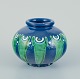 Kähler, 
Danmark. Vase i 
keramik. 
Kohornsteknik.
Glasur i blå 
og grønne 
toner.
Ca. 1930’erne. 
...