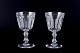 Val St. Lambert, Belgium, two "Lalaing" red wine glasses in clear faceted cut 
crystal glass.